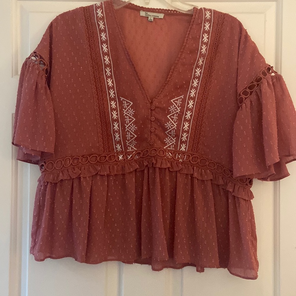 The Clothing Collective Boutique purchased top. Great for spring.